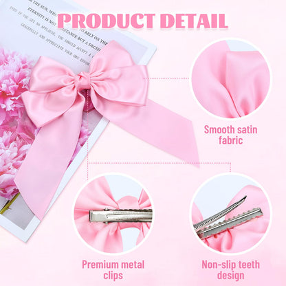 Close up view of the durable metal alligator clip mechanism on the back of the premium satin bow.