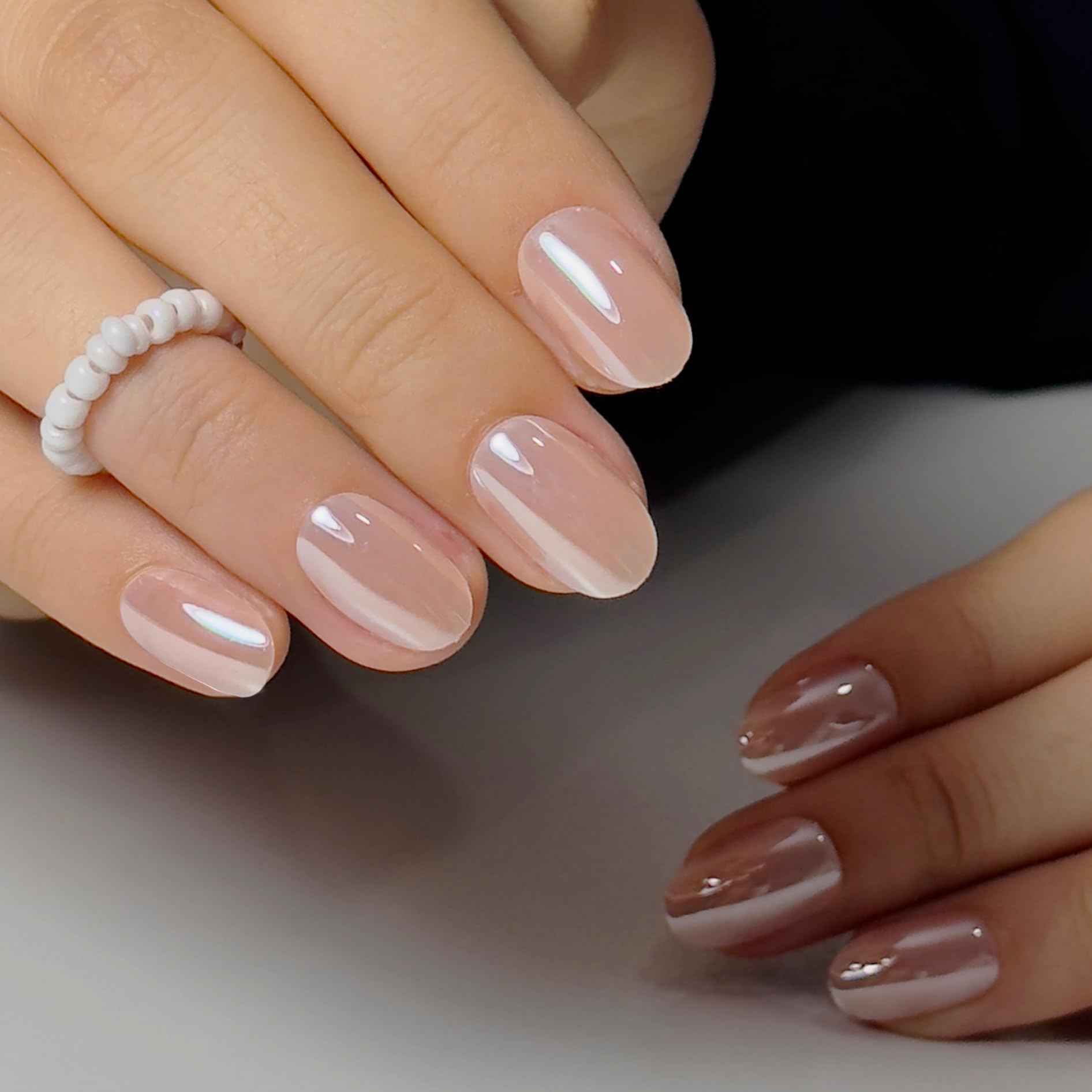 Close up of CurvLife champagne pearl gel nail texture