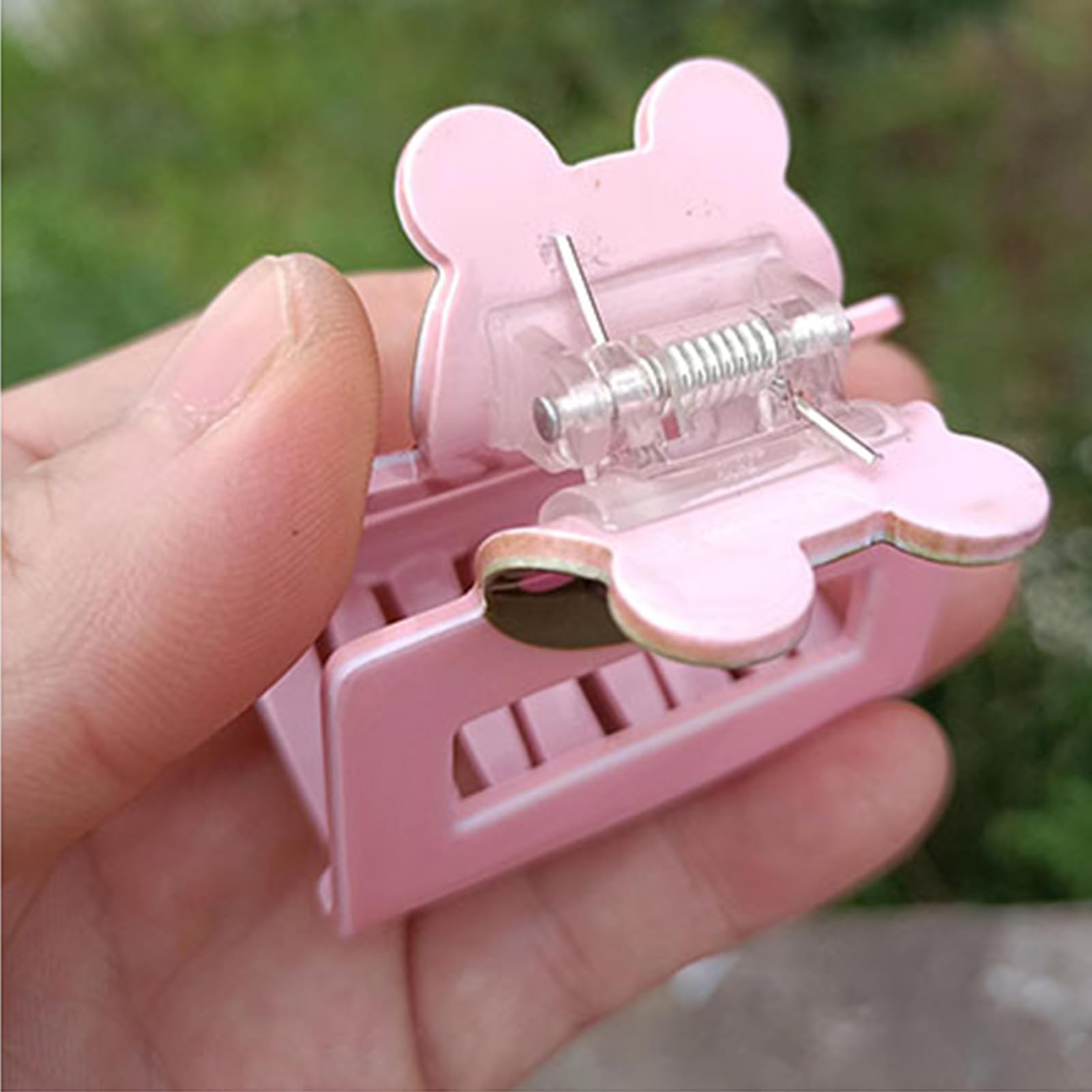 Side angle view highlighting the durable stainless steel structure of the hair clutcher replacement hardware.