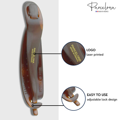 Large four point five inch tortoiseshell pattern hair accessory highlighting the smooth hand polished edges.