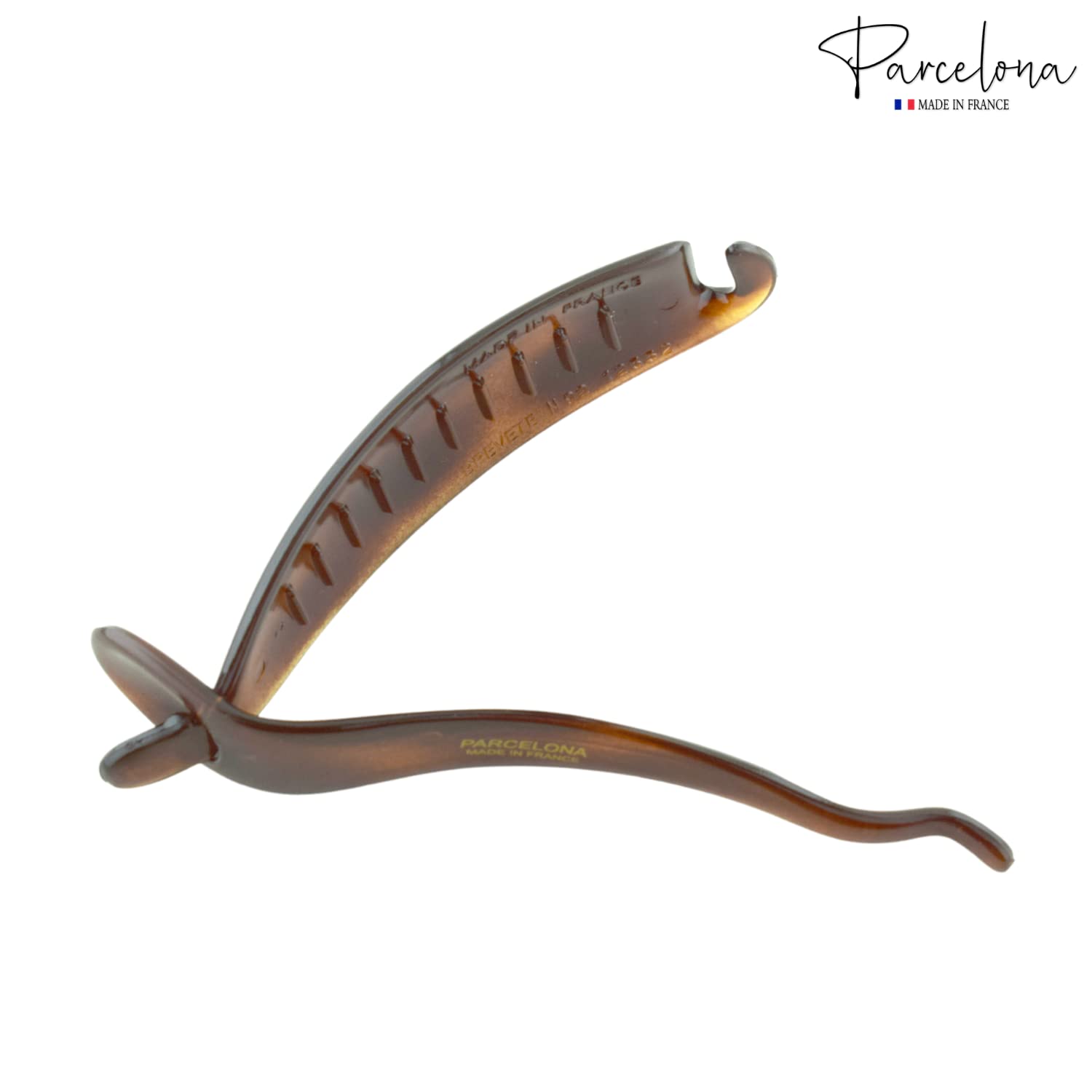 Parcelona large strong hold hair accessory showing the underside design and smooth surface texture.