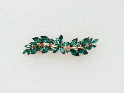 Faship luxury green crystal hair accessory side angle displaying the sturdy side release metal closure mechanism for secure non slip hold.