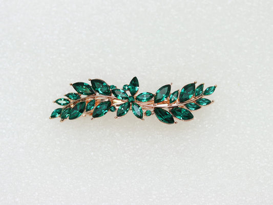 Faship luxury green crystal hair accessory side angle displaying the sturdy side release metal closure mechanism for secure non slip hold.
