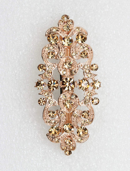 Faship luxury bridal hair clip close up highlighting the intricate light smoked topaz crystal flower petals.