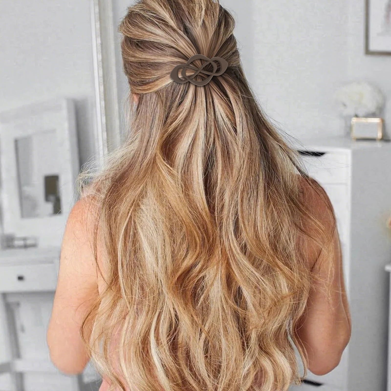 Close up view of the unique crossover design on the mocha brown Amariver hair barrette.