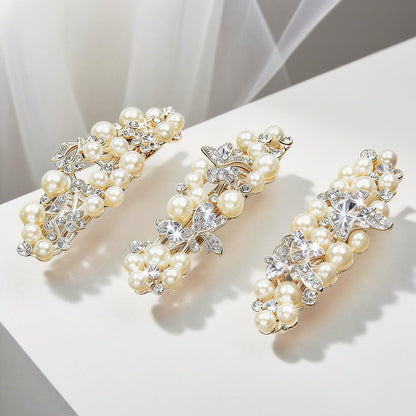 Packaging presentation of the fancy gold pearl hair barrette for women showcasing its high quality import finish.