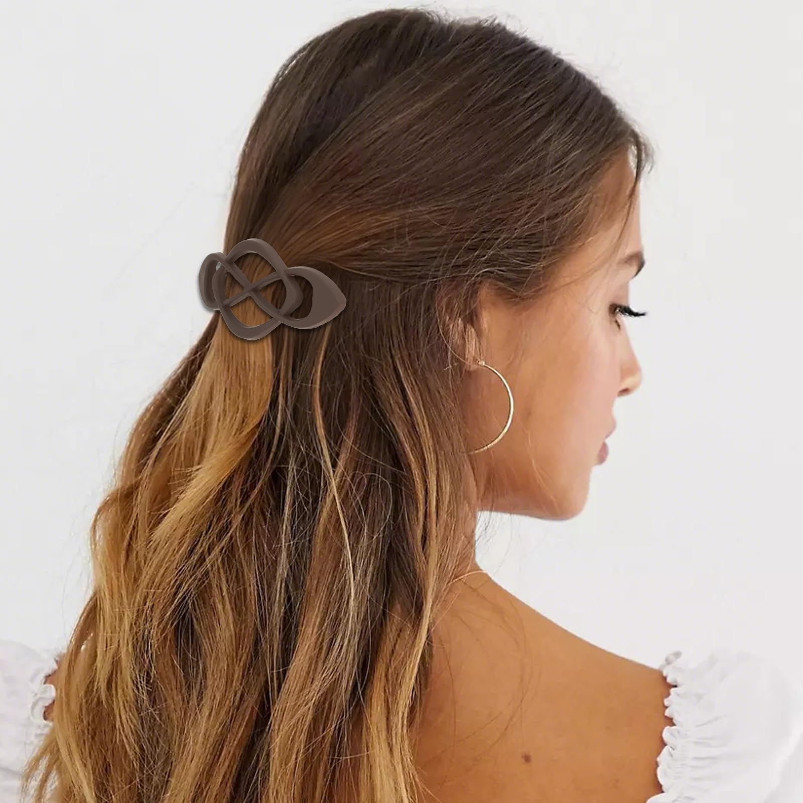Four pack of Amariver neutral toned hair accessories suitable for half up hairstyles.