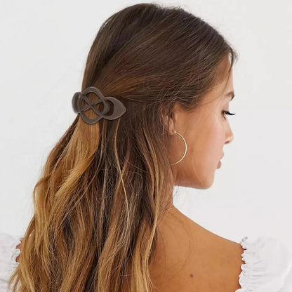 Four pack of Amariver neutral toned hair accessories suitable for half up hairstyles.