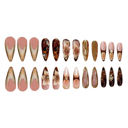 Close up of OHWODA almond shaped false nails with pearls