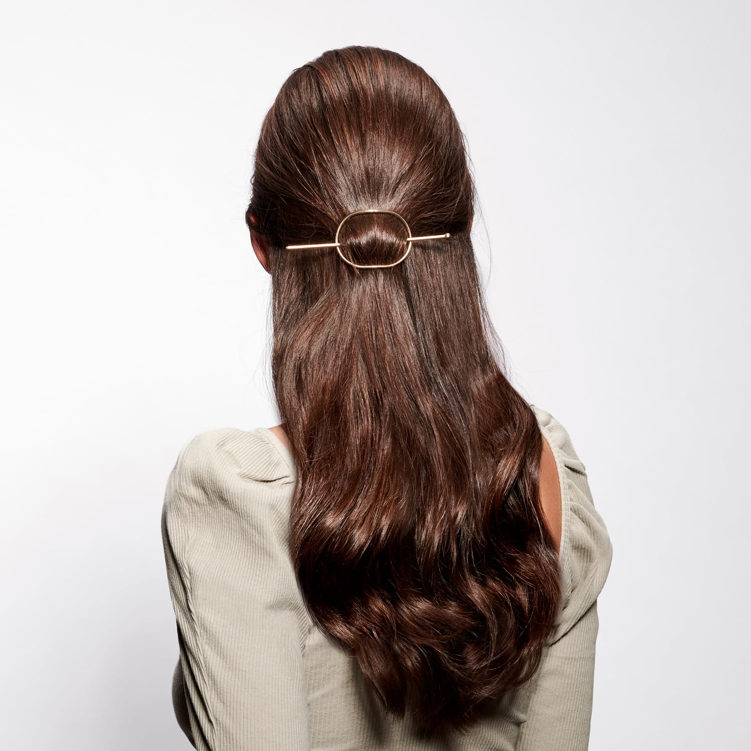 Side profile of the premium soft gold geometric hair accessory for modern styling.