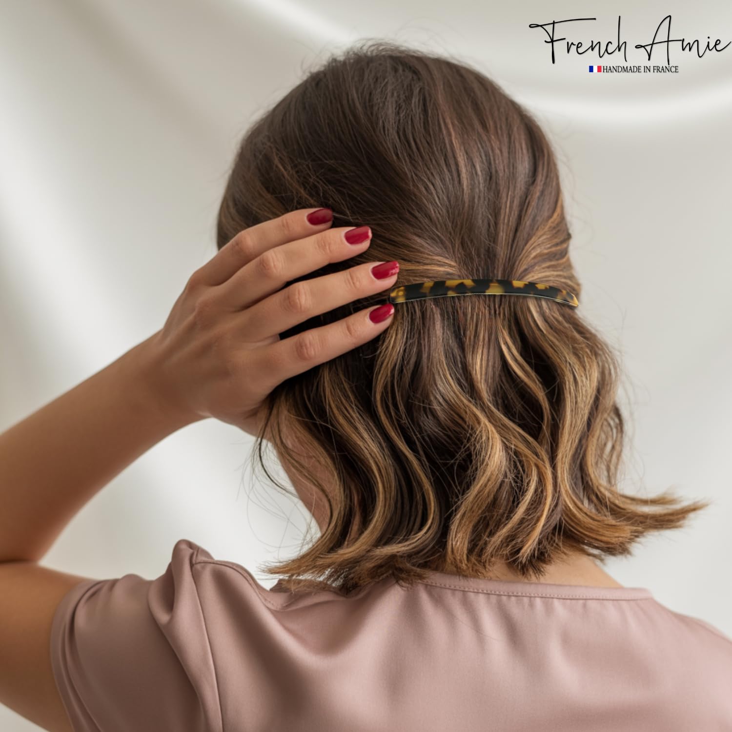 French Amie long and thin celluloid barrette side view displaying slender profile and smooth polished edges