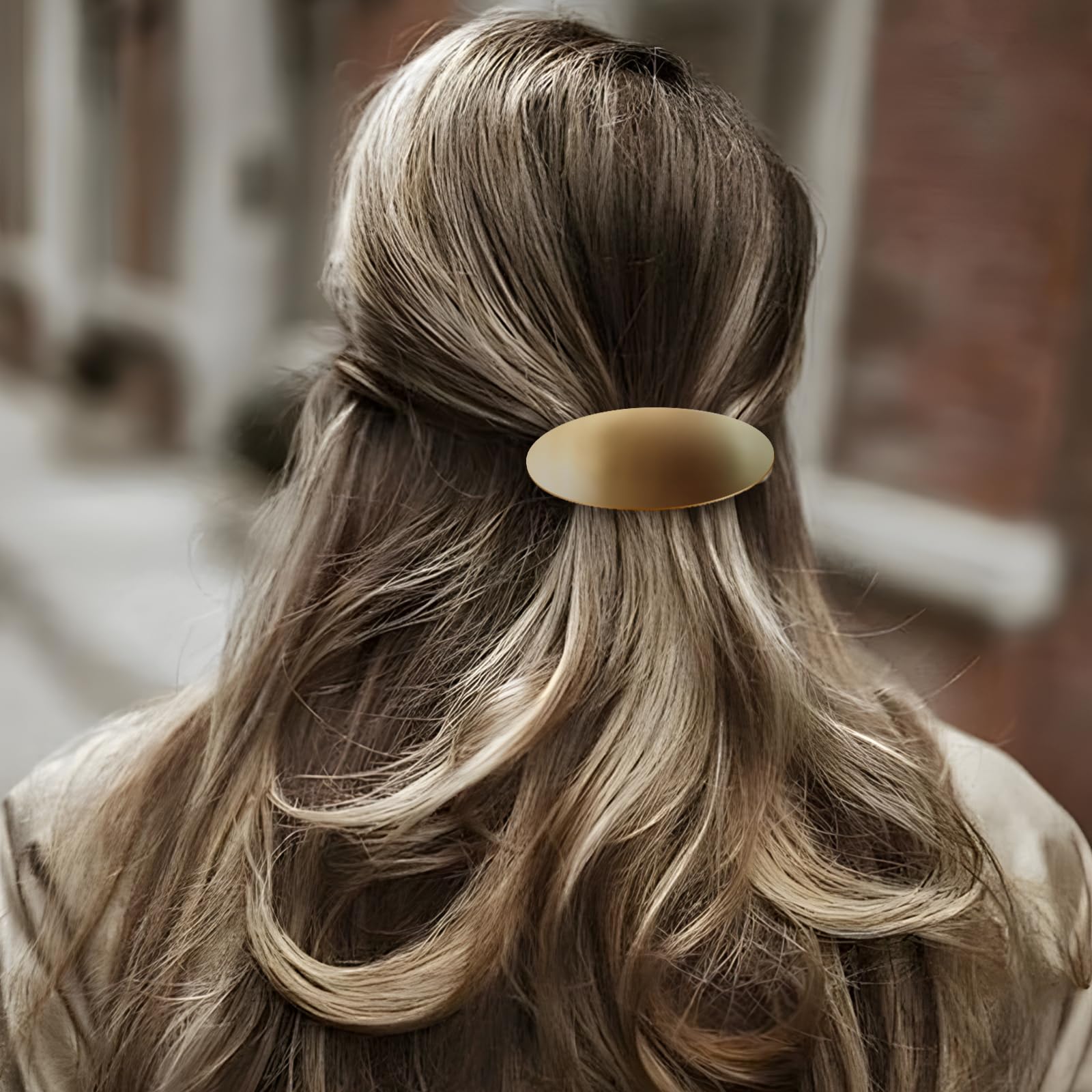 Close up details of the durable spring mechanism on the three inch metal hair clip