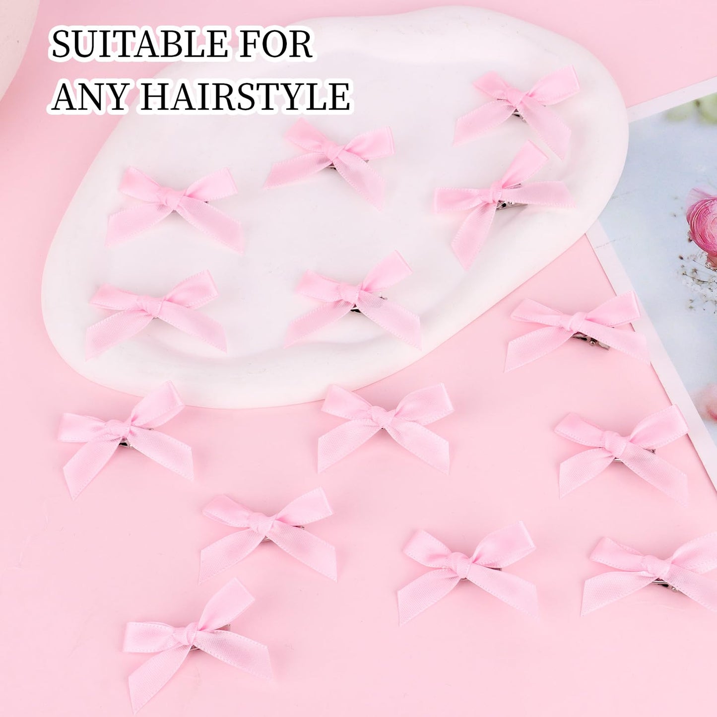Pink satin mini hair clips showcasing the sweet elegant texture of the premium fabric.