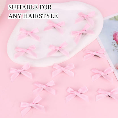 Pink satin mini hair clips showcasing the sweet elegant texture of the premium fabric.