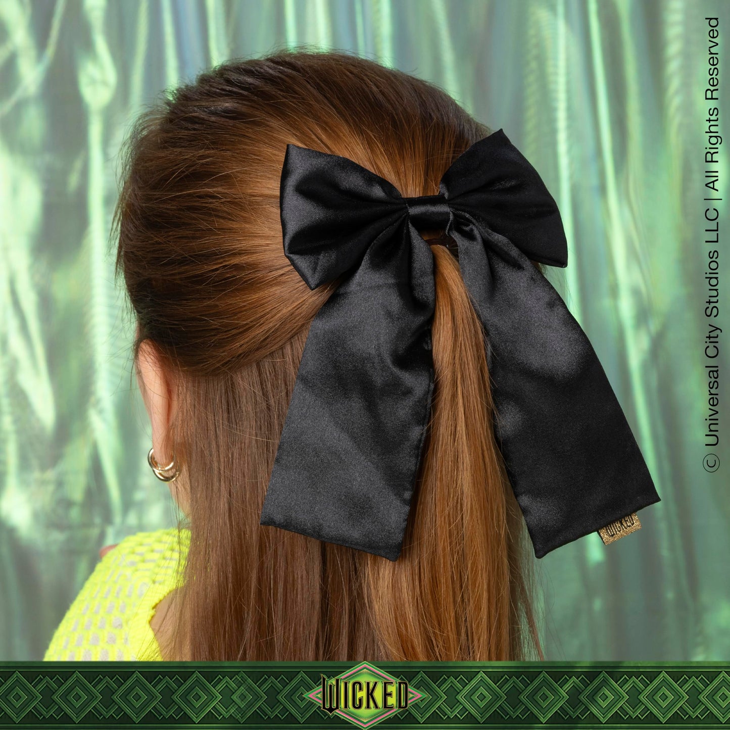 Premium black satin hair accessories for girls and women featuring authentic Wicked collection branding