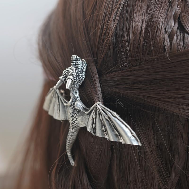 Side angle of the antiqued Viking style dragon barrette highlighting the detailed scale patterns.