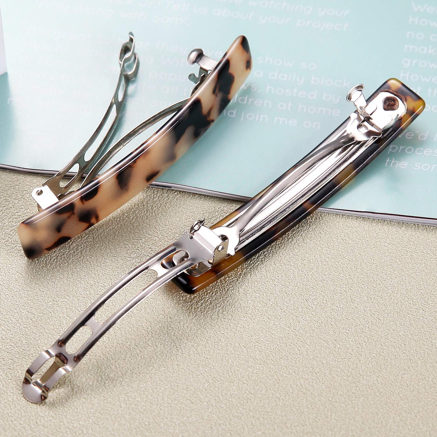 Demonstration of the non-slip grip of the Eyegla premium hair barrette holding a half-updo hairstyle firmly in place.