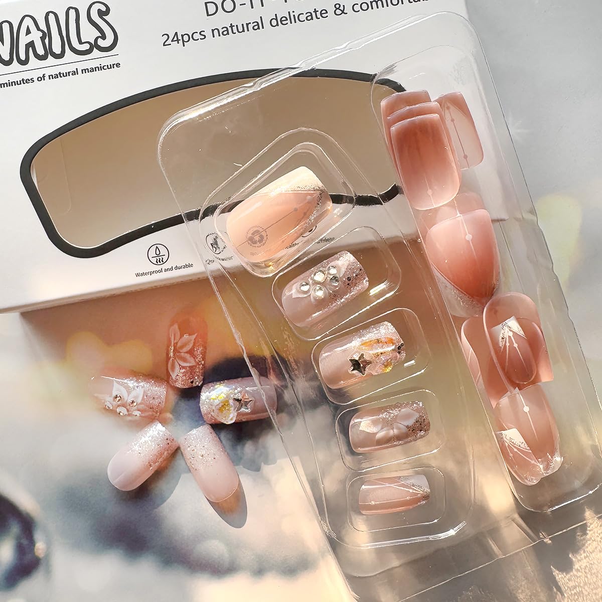 Kinretixia nude pink and white French tip press on nails on hand