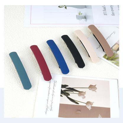 Twelve piece set of DF DUALFERV luxury matte barrettes packaged neatly for gifting.