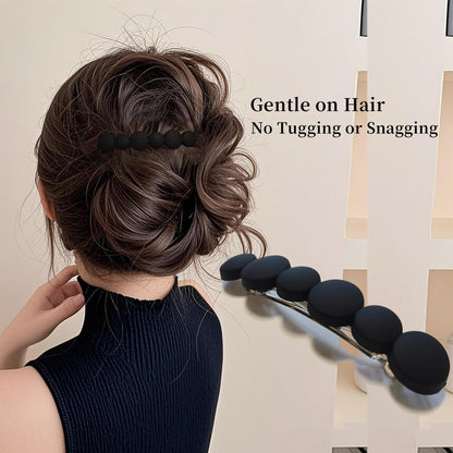 Markuii authentic USA imported neutral tone hair barrettes in a lifestyle setup.
