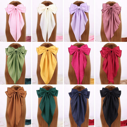 MRJ hair ribbons neatly arranged to show the lightweight fabric quality.