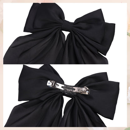 Lifestyle shot of the large metal barrette holding thick hair securely.