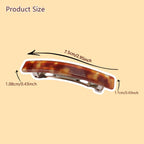 Close-up of the automatic metal spring clasp on the acetate hair clips