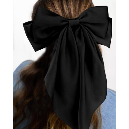 Elegant white statement hair bow displaying the detailed eight by thirteen point five inch dimensions