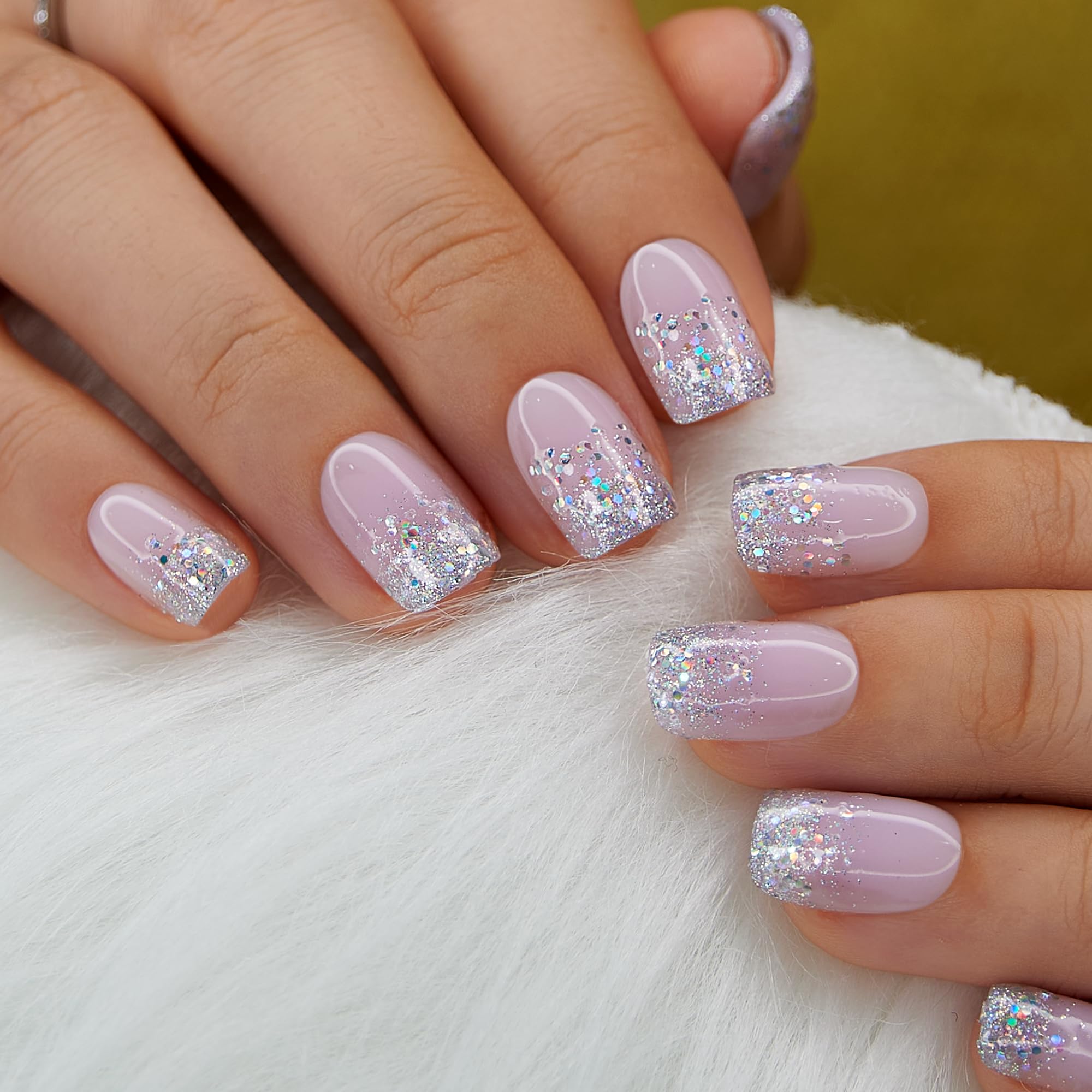 Natural pink base press on nails with silver French tip design
