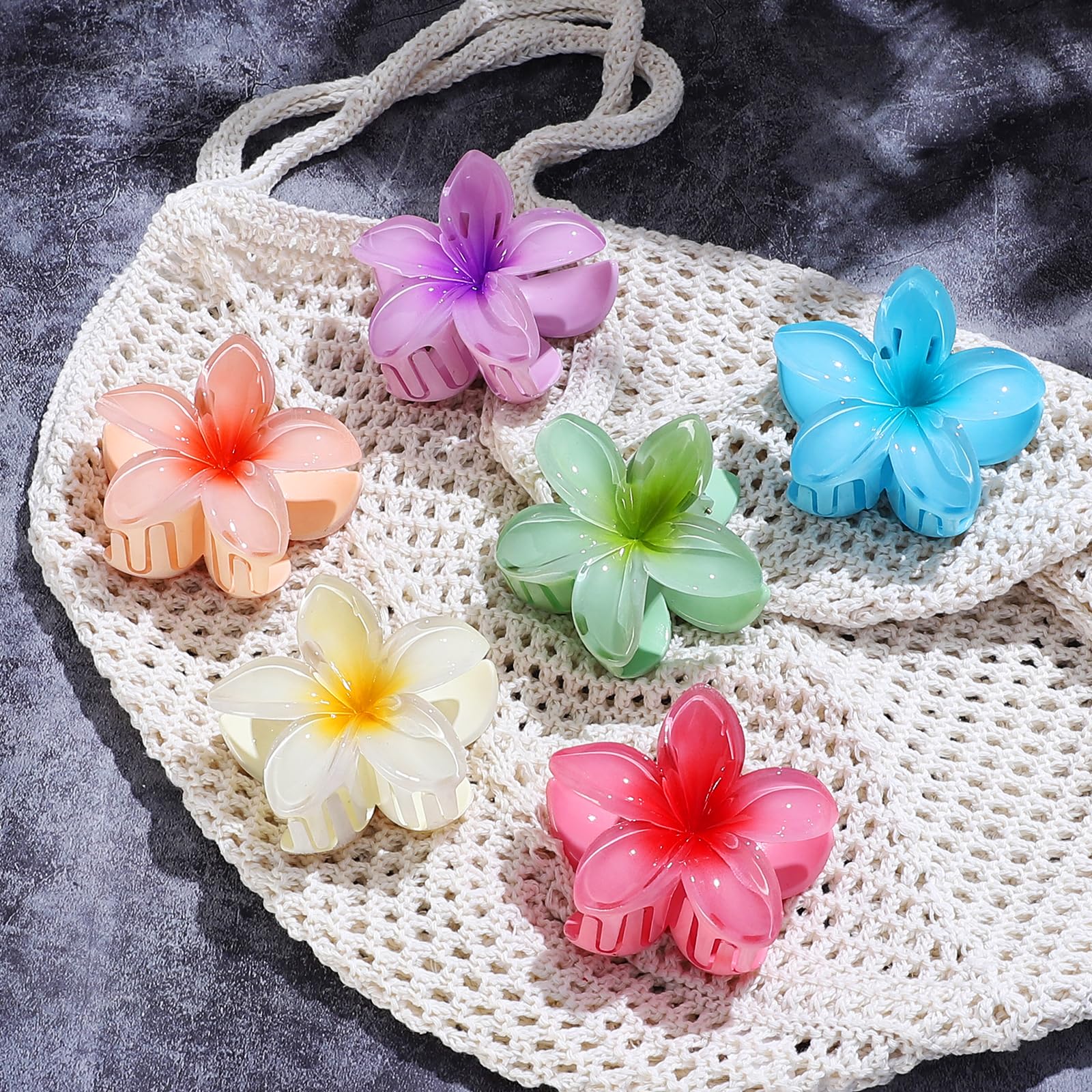 Large translucent hibiscus flower jaw clamp showing non slip interlocking teeth