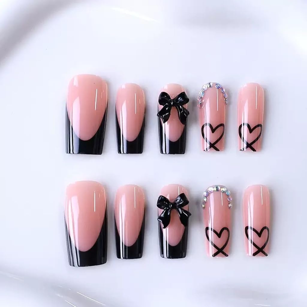 Press on nails with heart and bow charms for women