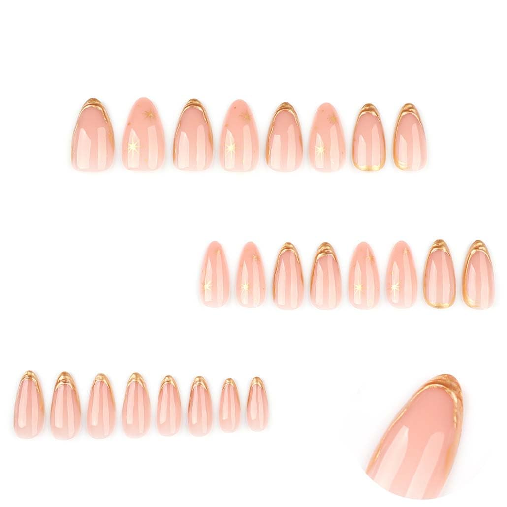 Close up of Tarini Foccna glossy nude press on nails with gold accents