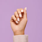 Close-up of Point Pink glossy solid color fake nails arranged neatly in the box
