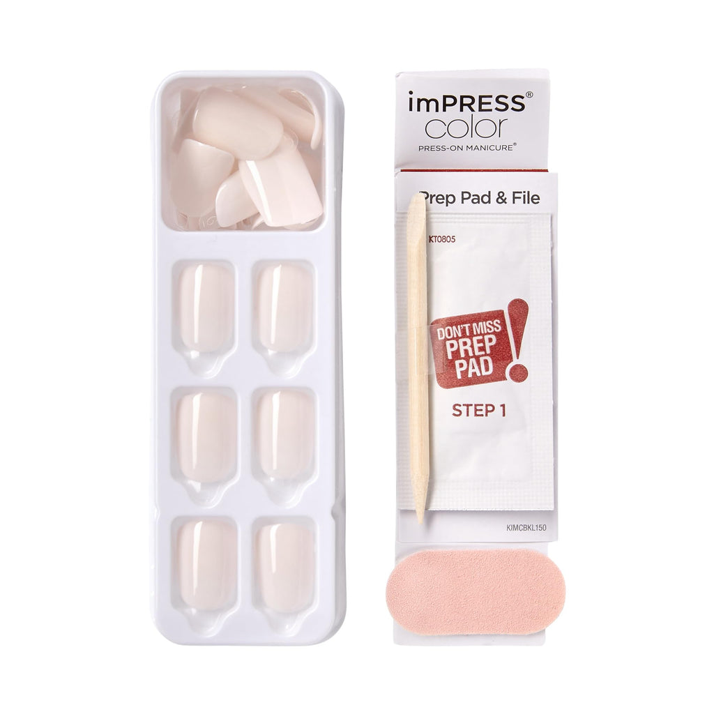 Complete contents of the Kiss Impress nail kit including thirty assorted nails, prep pad, and file