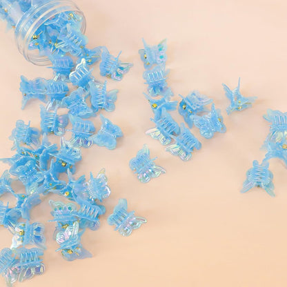 Girl wearing blue butterfly hair clips as hair accessory