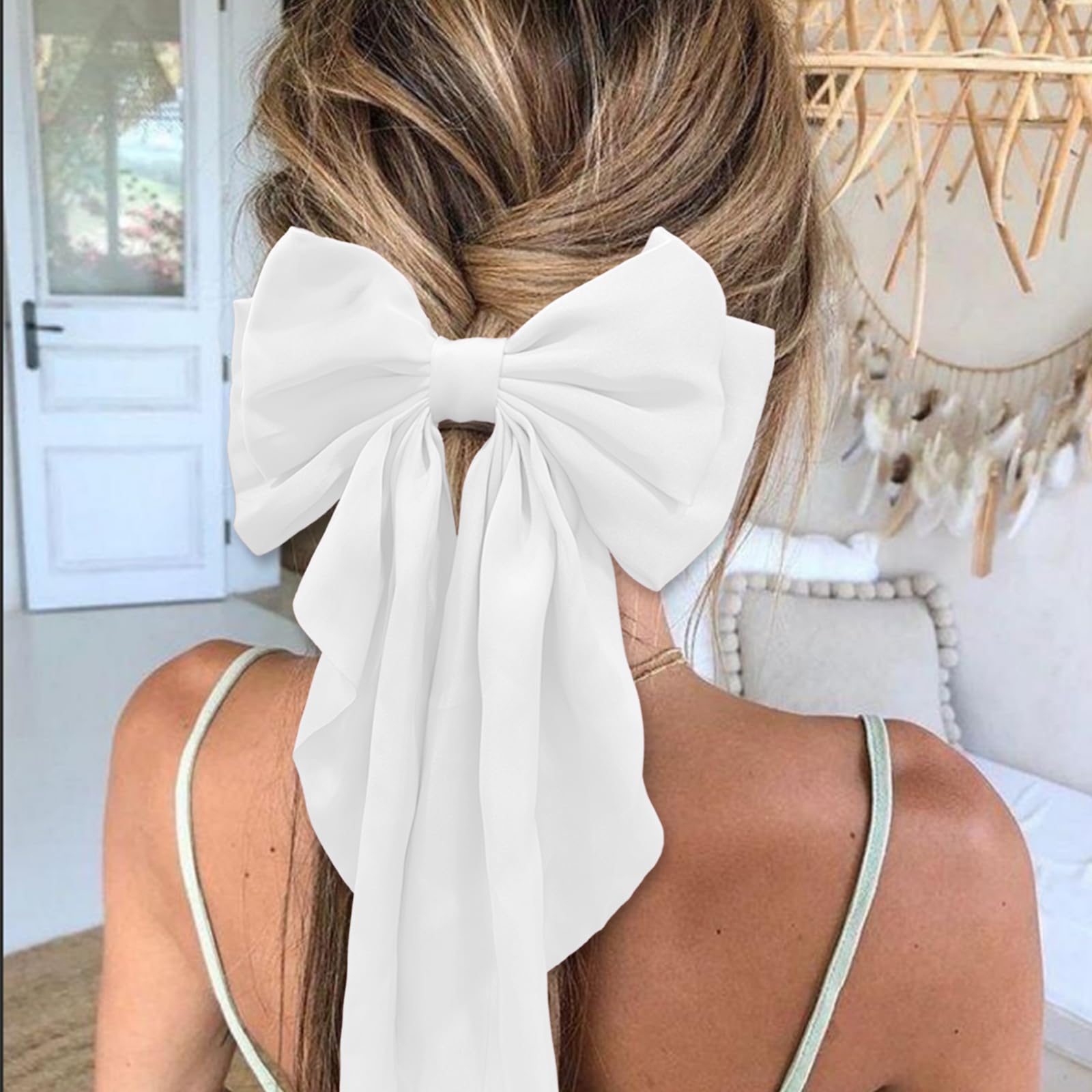 Close up details of the premium smooth satin fabric on ILLPTA white hair bow
