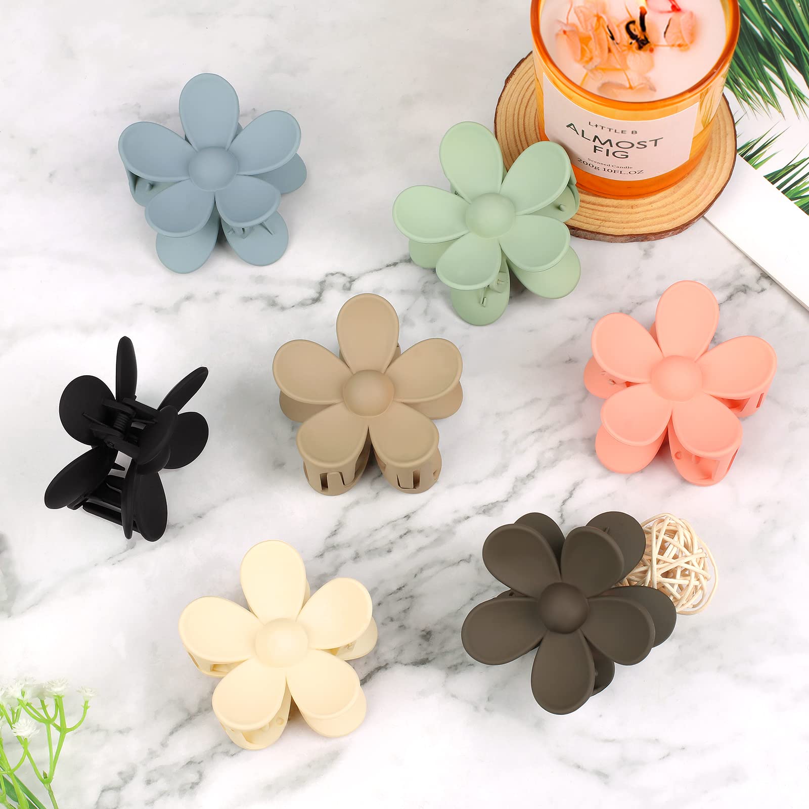 Seven vibrant colors of lightweight vivinin flower hair clips packaging.