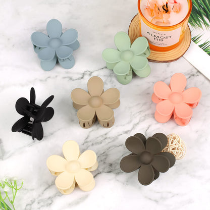 Seven vibrant colors of lightweight vivinin flower hair clips packaging.