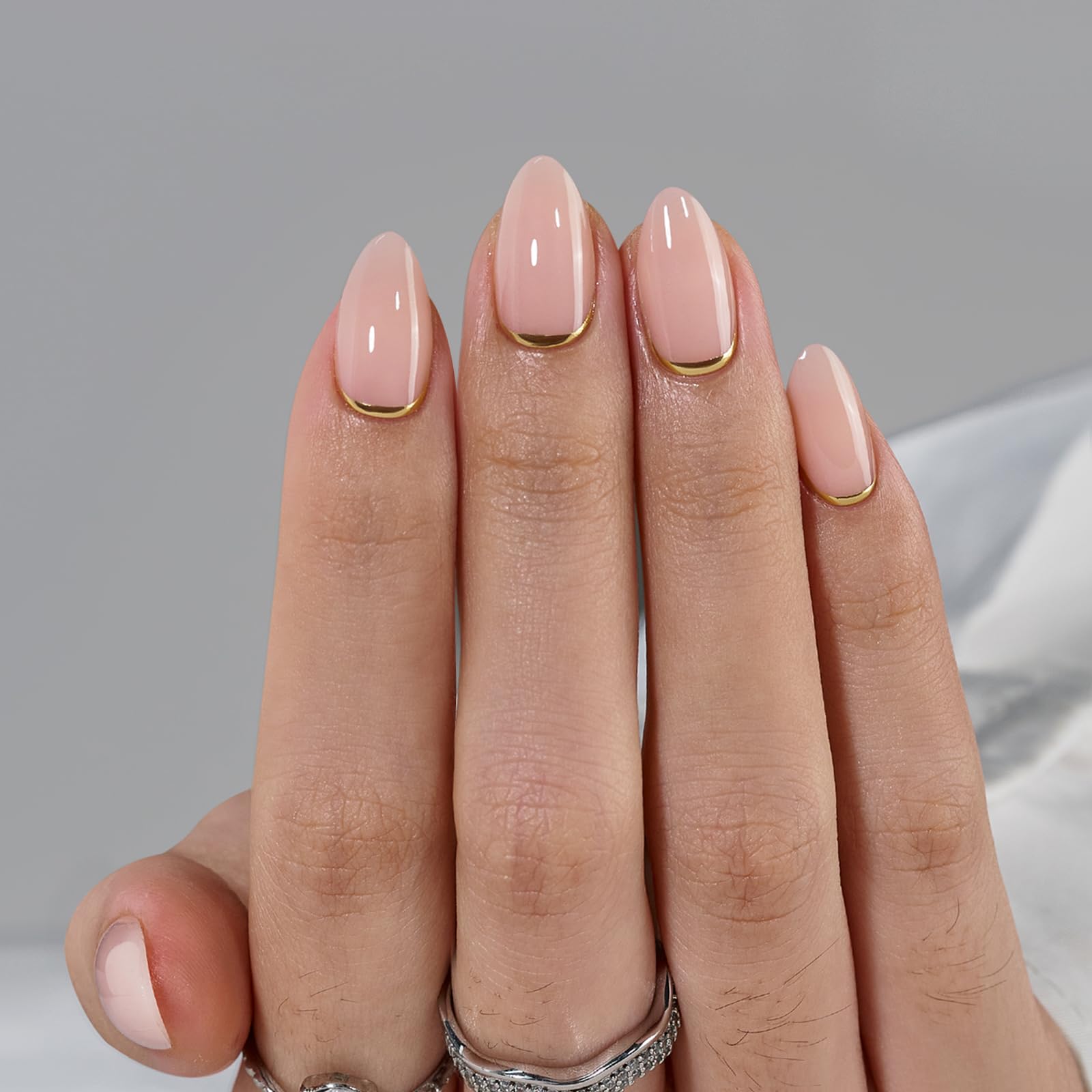 BTArtbox soft gel almond nails with gold accent detail
