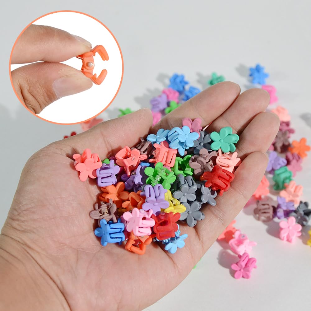 Demonstration of the colorful mini hair claw clips holding toddler bangs securely in place.