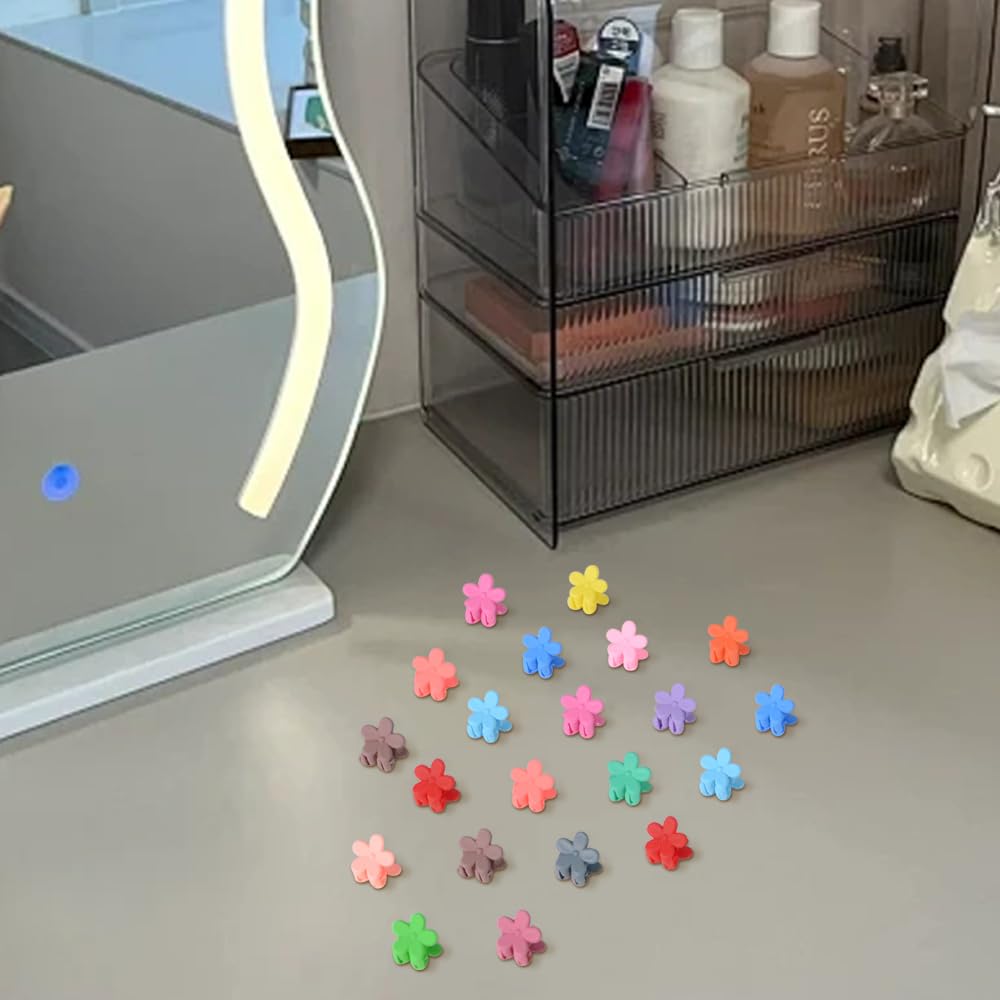 Packaging view of the fifty pack matte finish mini flower hair clamps for women and kids.
