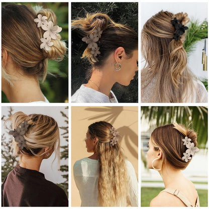 Four pieces of tropical floral hair clips arranged neatly on a neutral background.