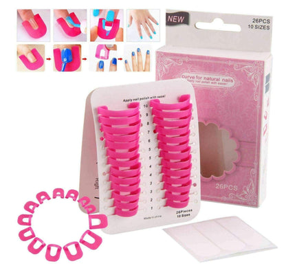 Close up view of pink U shaped finger guards applied to fingertips preventing nail polish smudging on skin.