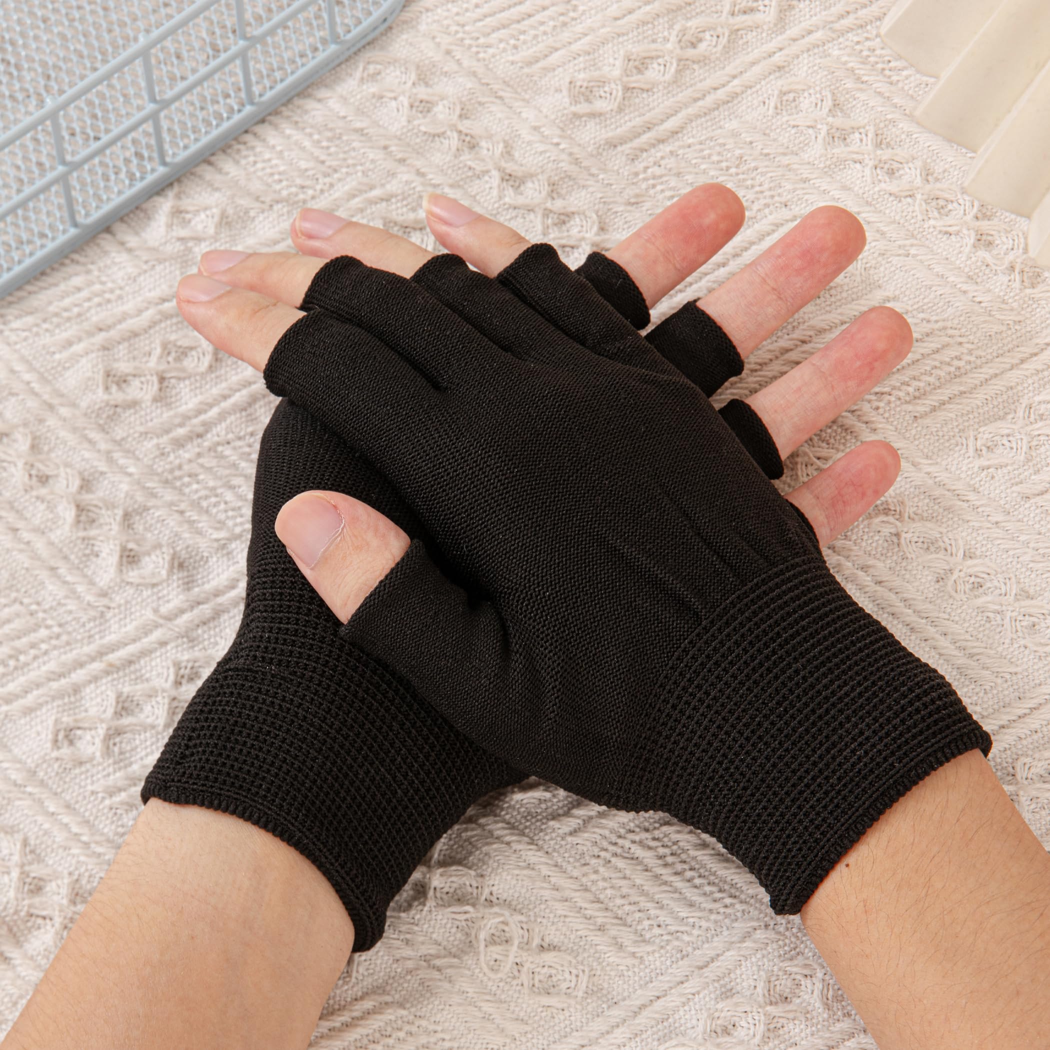 Model wearing Bouttarro UV protection gloves during gel nail lamp use