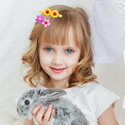 Side angle view of the lightweight non toxic acrylic toddler hair barrettes.