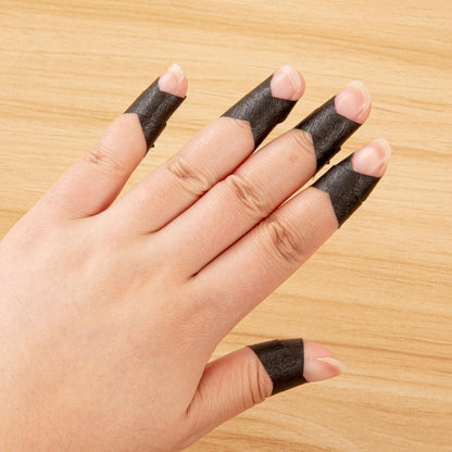 Professional nail tech essential kit including gloves and cuticle guard tape