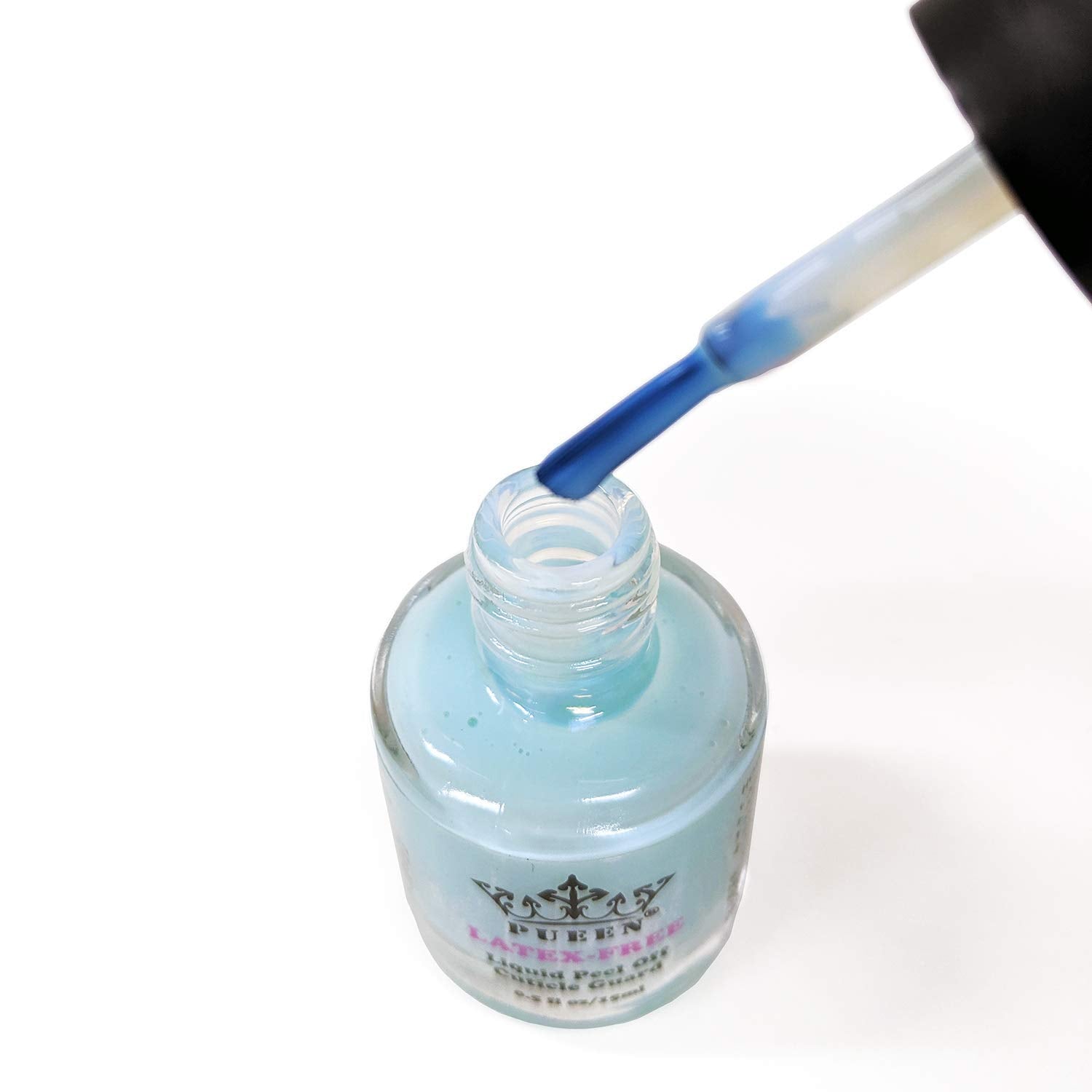 Blue liquid tape drying clear around the nail bed for stamping protection