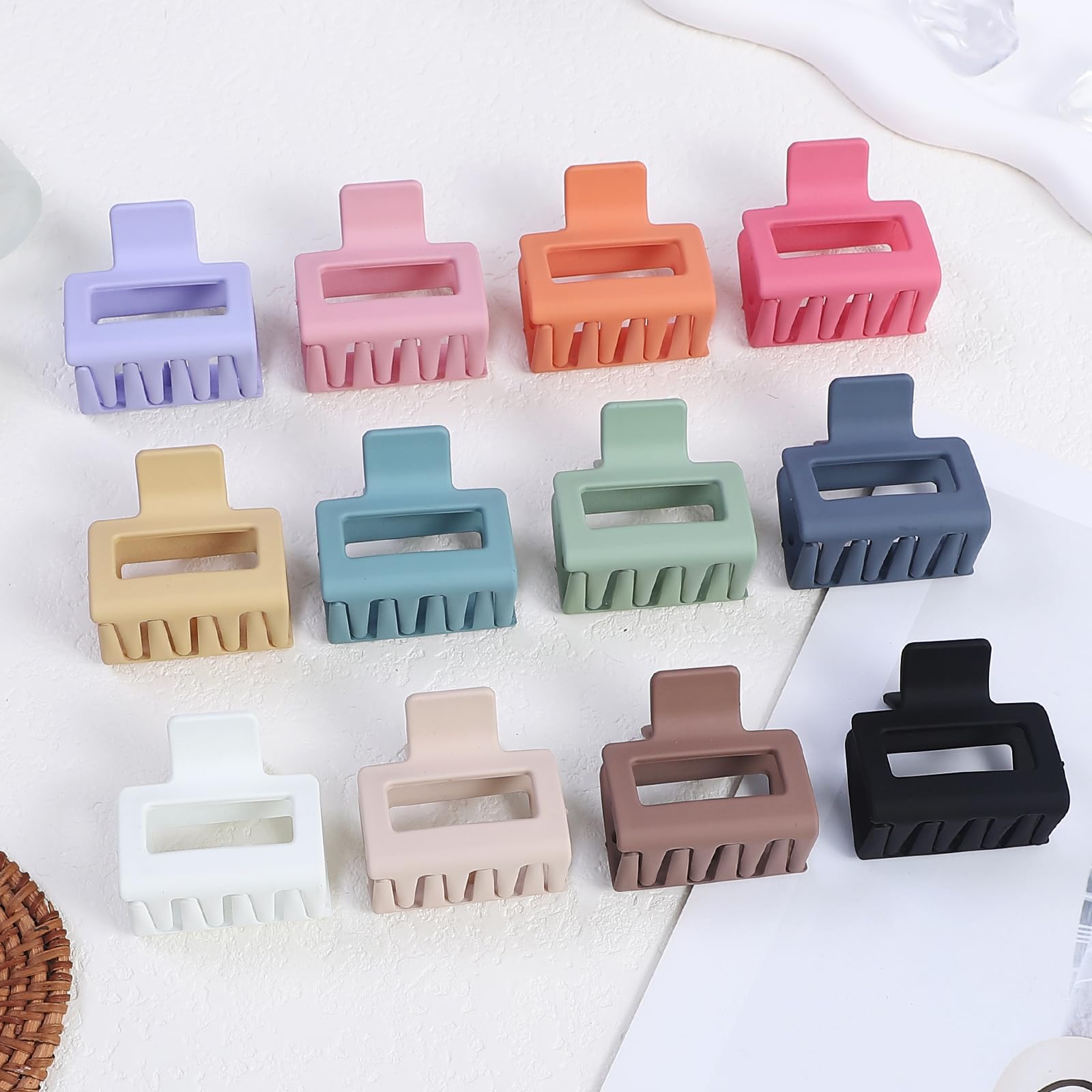 Flat lay arrangement of the twelve piece Sisiaipu imported hair claw clip set in assorted pastels