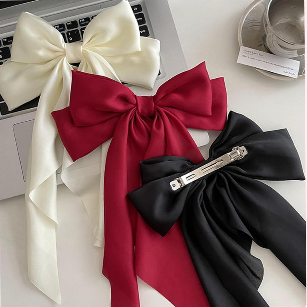 Eight pack colorful long tail ribbon hair clips displayed neatly together