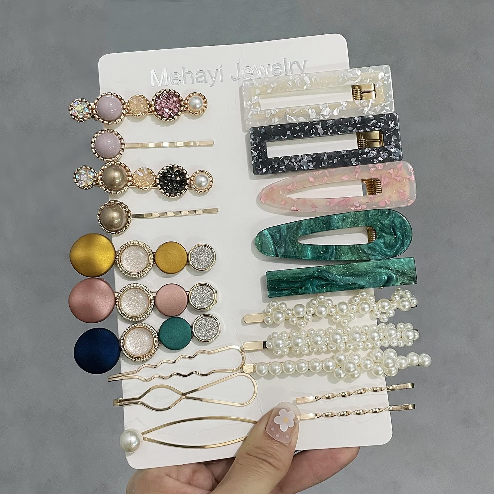 Mehayi elegant gold hair accessories with delicate white imitation pearls displayed together.